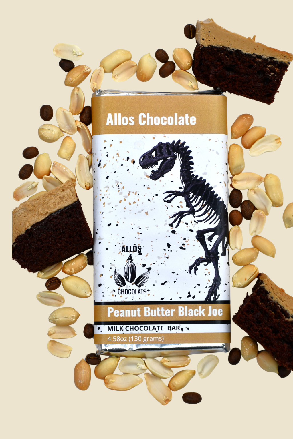 Allos Chocolate Peanut Butter Black Black Joe milk chocolate bar surrounded by peanuts and pieces of chocolate cake on a beige background.